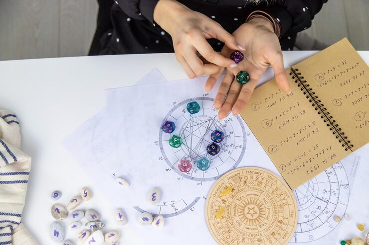 woman-numerologist-astrologer-counts-numbers-selective-focus_472916-6257